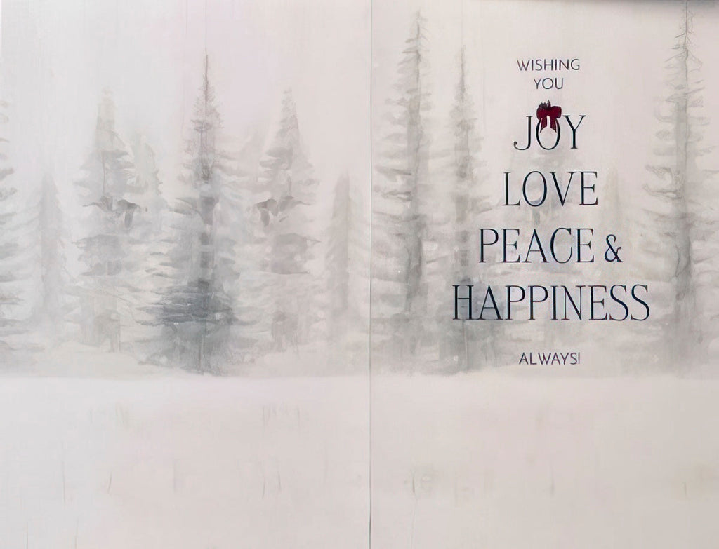 Inside of a holiday greeting card displaying a serene snowy winter forest scene with tall pine trees. The text in elegant font reads 'WISHING YOU JOY LOVE PEACE & HAPPINESS ALWAYS!'.
