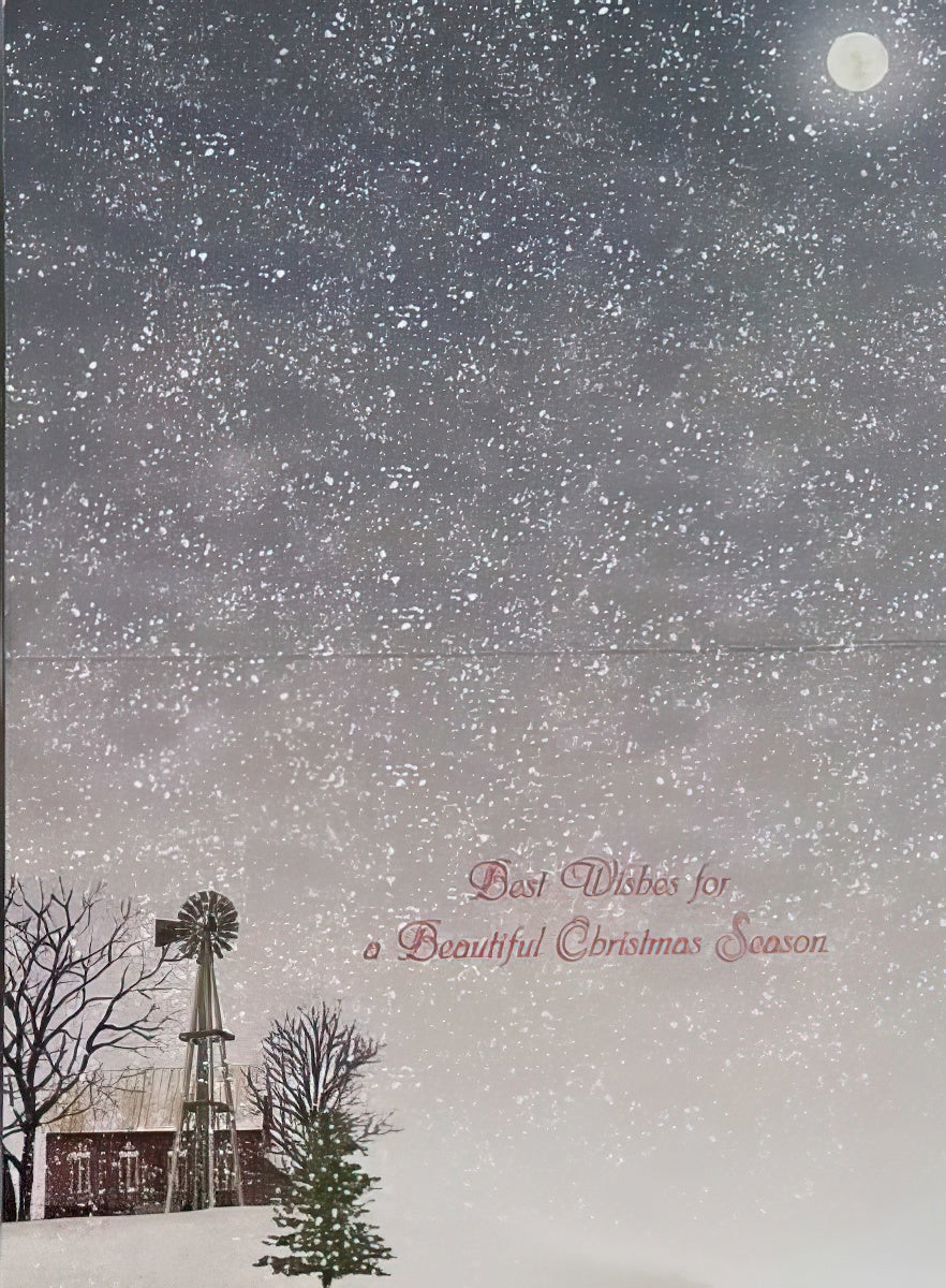 The inside of a winter-themed greeting card, displaying a message that reads "Best Wishes for a Beautiful Season" against a backdrop of a snowy landscape with a windmill and bare trees under a night sky.
