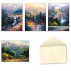 A set of four nature-themed greeting cards and an envelope. The cards feature vibrant landscape paintings of mountains, waterfalls, and lakes with lush forests. One card depicts a cascading waterfall over a rocky cliff amidst colorful foliage. Another shows a calm lake reflecting mountains and trees under a warm sky.