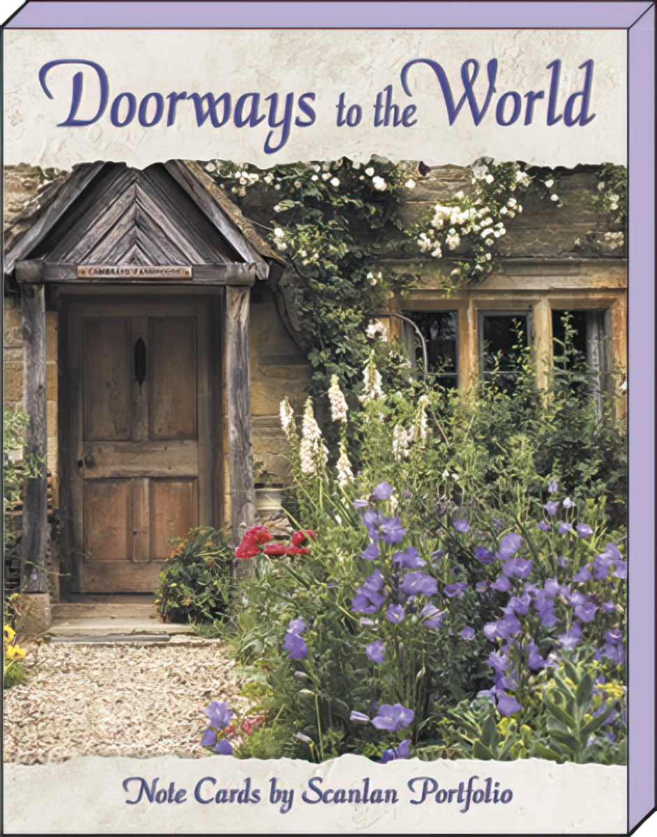 Front cover of 'Doorways to the World' blank greeting card assortment by Scanlan Portfolio, featuring an inviting rustic stone doorway with a wooden door and lush purple and white flowers.