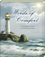 Front cover of a 'Words of Comfort Sympathy Cards by Anthony Casay' box, featuring a majestic lighthouse on a rocky coast under a moonlit sky with crashing waves, evoking a sense of solace and guidance.