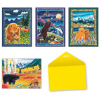 Four different bear-themed greeting cards and a bright yellow envelope. Designs include a brown bear in a flower field, a black bear looking at the moon with birds, two bear cubs in a purple field, and a black bear with a raccoon in an autumn forest.