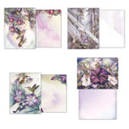 Four distinct hummingbird art greeting cards by Jody Bergsma, each shown with its unique front and coordinating blank inside design, highlighting the variety of nature-themed illustrations.
