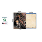 Detail of a single greeting card from the Cow-Pups assortment, showing a Jack Russell puppy peeking from a saddle, with card dimensions (4.5 x 5.5 inches), sustainably-sourced paper, and soy-based inks, Made in USA labels.