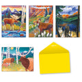 Assortment of four vibrant greeting cards featuring different mountain wildlife scenes (moose, bighorn sheep, wolves/bear, elk/deer) and a bright yellow envelope.