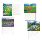 Four individual mountain wildflower greeting cards unfolded, displaying their unique nature scene fronts and blank patterned interiors, highlighting the variety in the card set.