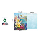 Single greeting card featuring hummingbirds and flowers (narcissus, bluebells) with 'Sustainably-Sourced Paper,' 'Soy-Based Inks,' and 'MADE IN USA' labels, showing front and blank light blue inside, with dimensions 5 1/2" x 4 1/2".