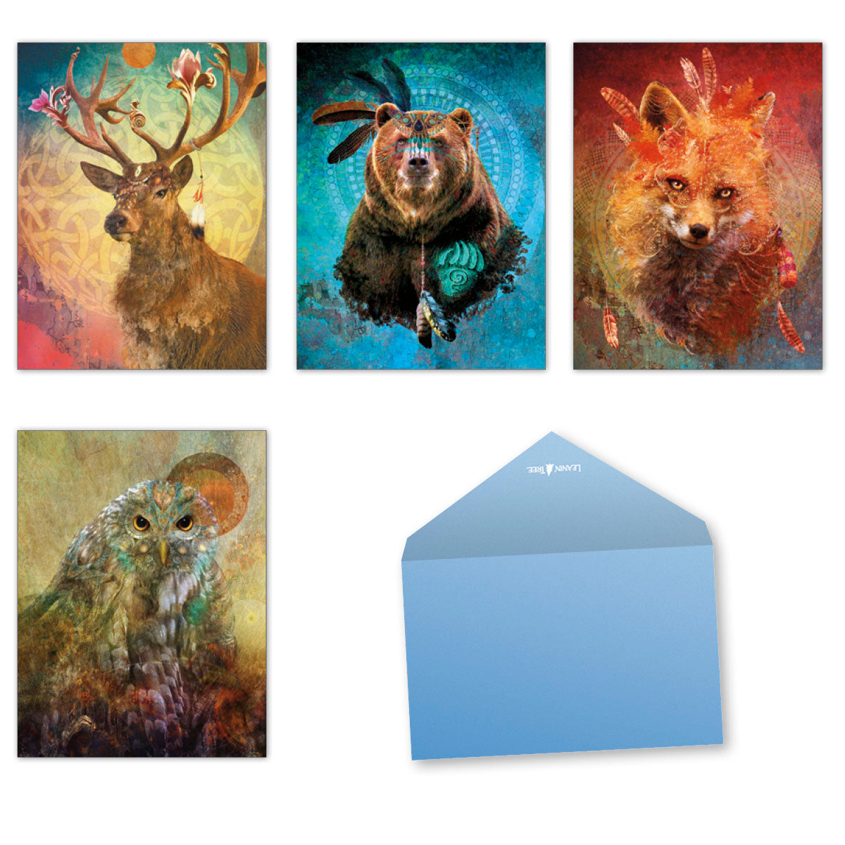 Collection of four 'Wild Spirits' blank greeting cards featuring artistic illustrations of a majestic stag, a wise bear, a cunning fox, and a watchful owl, accompanied by a light blue envelope. Perfect for all occasions.