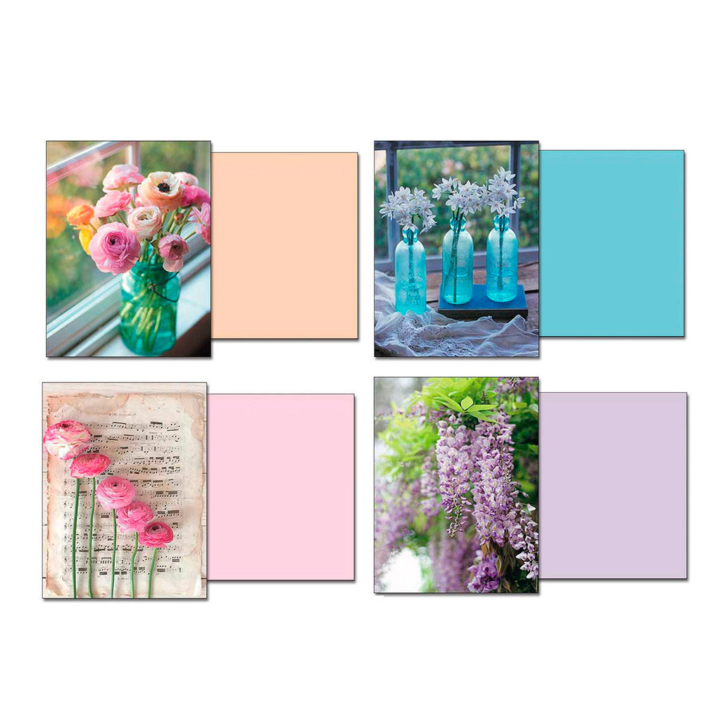 SEO-optimized alt description for a charming greeting card featuring a colorful bouquet of pink, orange, and cream ranunculus flowers in a teal mason jar by a sunny window, part of a cheerful floral note card assortment.