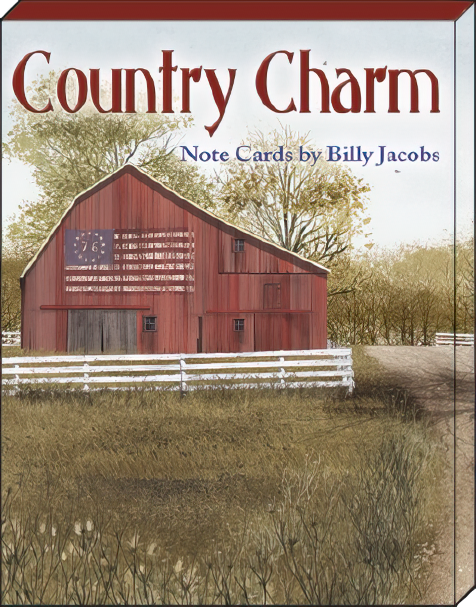 Close-up of the 'Country Charm Note Cards by Billy Jacobs' box cover, featuring a red barn with an American flag design and a white fence in a scenic countryside setting.