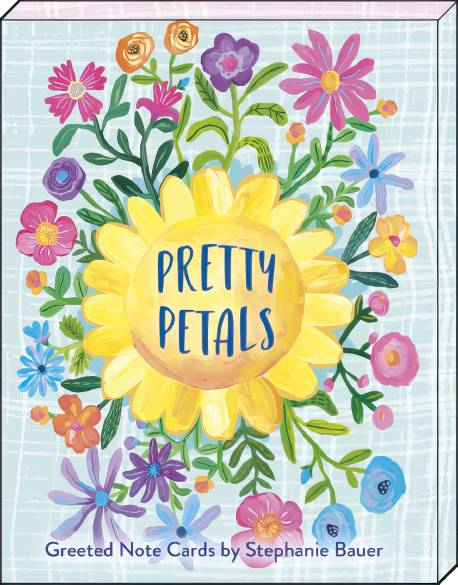 Front of Pretty Petals greeted note cards box by Stephanie Bauer, featuring a large yellow sunflower and colorful floral designs on a light blue patterned background.