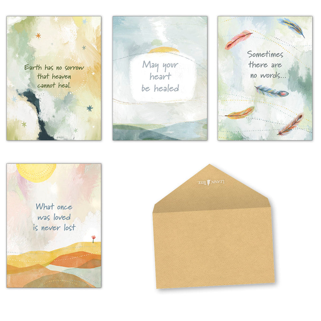 Four distinct sympathy greeting cards with abstract watercolor designs featuring comforting messages, along with a simple brown envelope.