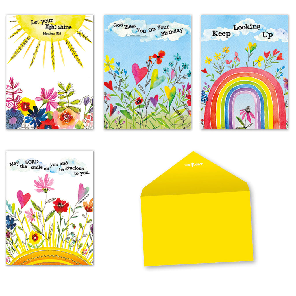 Collection of four open religious greeting cards and one bright yellow envelope. Cards feature watercolor art: a sunny 'Let your light shine' card with flowers, a 'God Bless You On Your Birthday' card with hearts and flowers, a 'Keep Looking Up' card with a rainbow and flowers, and a 'May LORD the smile on you' card with sun and hearts.