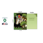 Open view of the zebra greeting card showing its 4.5 x 5.5 inch dimensions, the inside message 'LOVE YOUR WILD AND WONDERFUL SPIRIT! HAPPY BIRTHDAY', and eco-friendly logos for Sustainably-Sourced Paper, Soy-Based Inks, Made in USA.