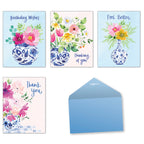 A set of four Chinoiserie Bleu greeting cards with watercolor floral designs in blue and white vases. Messages include 'Birthday Wishes', 'Thinking of you', 'Feel Better', and 'Thank you'. A matching light blue envelope is also shown.
