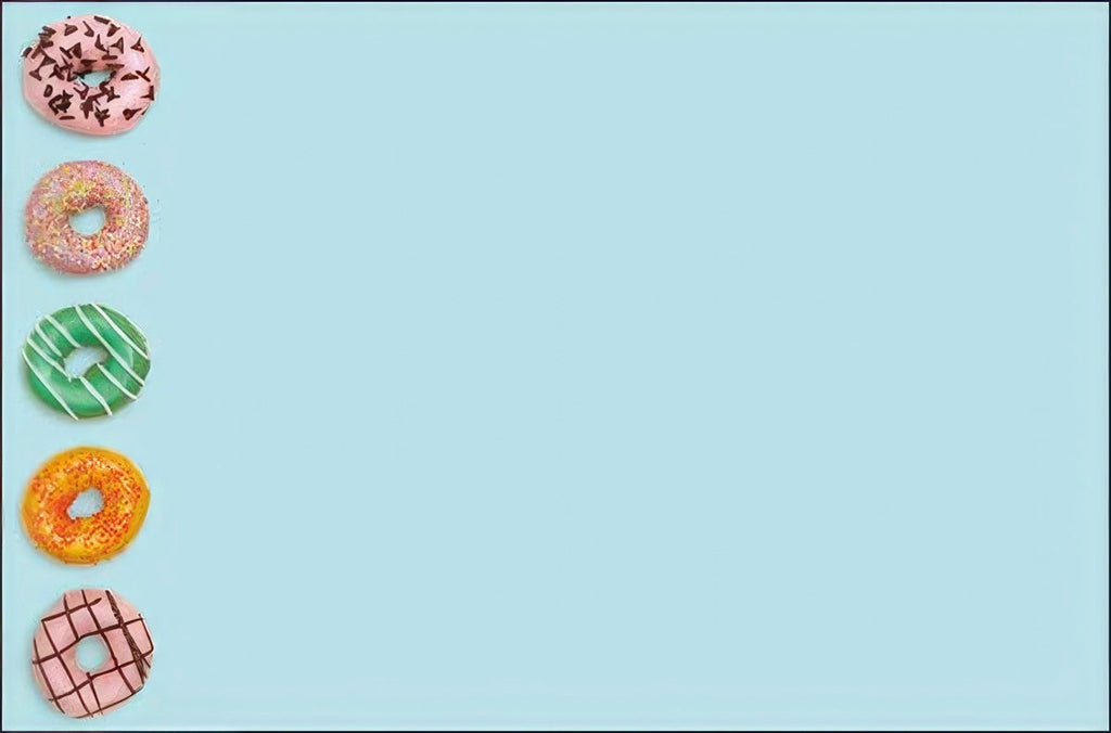 Blank inside of a cheerful greeting card, showing a vertical stack of five colorful frosted donuts with sprinkles on the left against a light blue background, providing ample space for a personalized handwritten message.