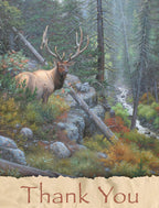 Stunning nature-themed thank you card featuring a majestic bull elk with large antlers standing amongst pine trees and rocks next to a mountain stream, with 'Thank You' elegantly printed below.