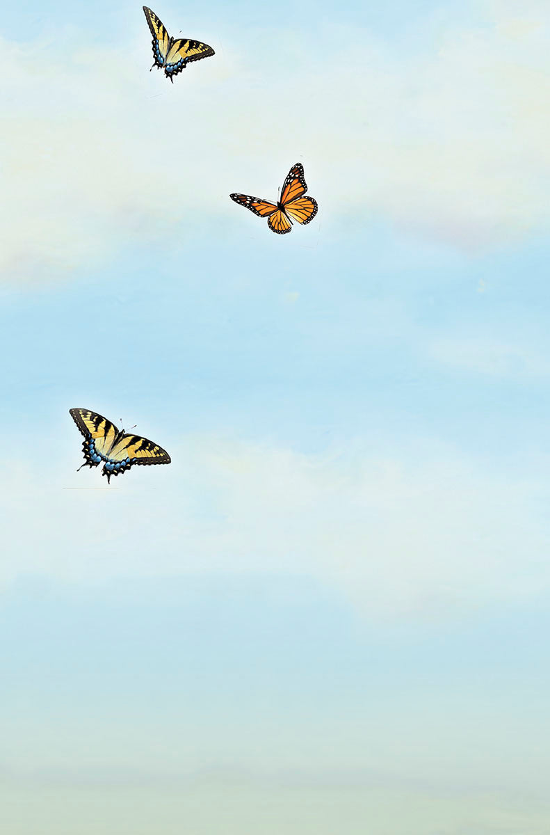 Bright blue sky background with three yellow and black butterflies flying gracefully.