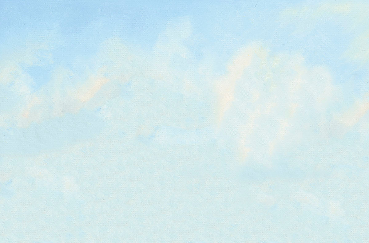 Soft blue sky with wispy white clouds, a serene and calming background for a thoughtful greeting card.