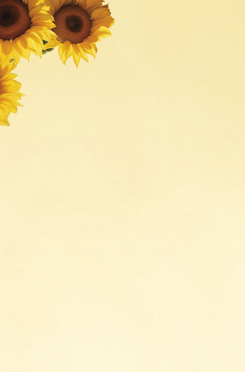 A blank greeting card background with bright yellow sunflowers in the top left corner against a light yellow, sunlit sky.