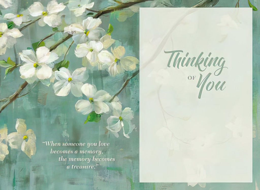 Open view of a comforting greeting card interior, showing graceful dogwood branches, the message 'Thinking of You', and a touching quote: 'When someone you love becomes a memory, the memory becomes a treasure.'
