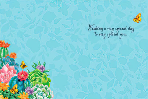 Inside view of a cheerful greeting card with a light blue botanical pattern, a corner of colorful succulents and butterflies, and 'Wishing a very special day to very special you' text.