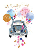 Whimsical wedding greeting card featuring a decorated vintage 'Just Married' car, colorful balloons, and floral accents, perfect for a celebratory couple.