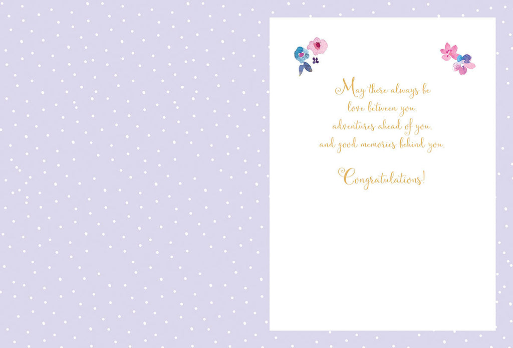 Inside of a lighthearted wedding card with a purple polka-dot background, featuring a heartfelt 'Congratulations!' message in elegant gold script with small floral designs.
