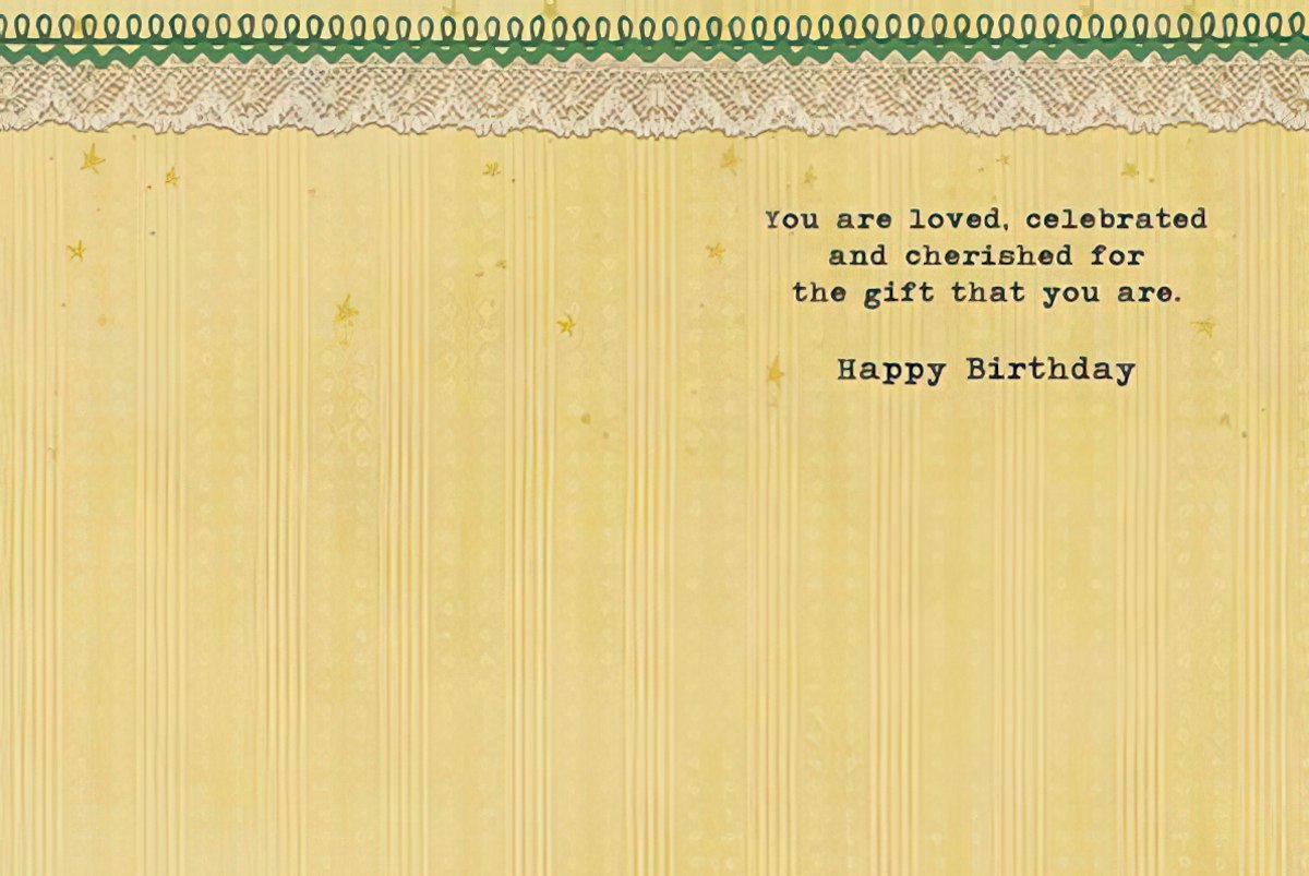 Inside of a heartfelt birthday card with a yellow striped background and decorative lace trim, displaying the message: 'You are loved, celebrated and cherished for the gift that you are. Happy Birthday.'