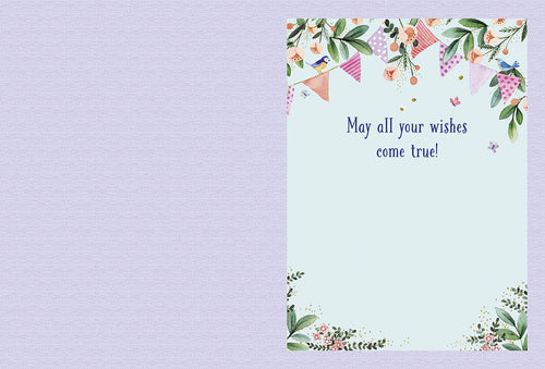 Open greeting card interior with a blank left panel and the right panel displaying the message 'May all your wishes come true!' surrounded by delicate watercolor floral and bunting details.
