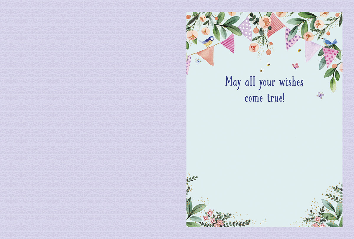 Inside of the whimsical birthday greeting card for children. The light blue background continues, framed by delicate floral and bunting details in the corners. The message 'May all your wishes come true!' is printed on the right side, with ample blank space below for a personalized, heartfelt message.