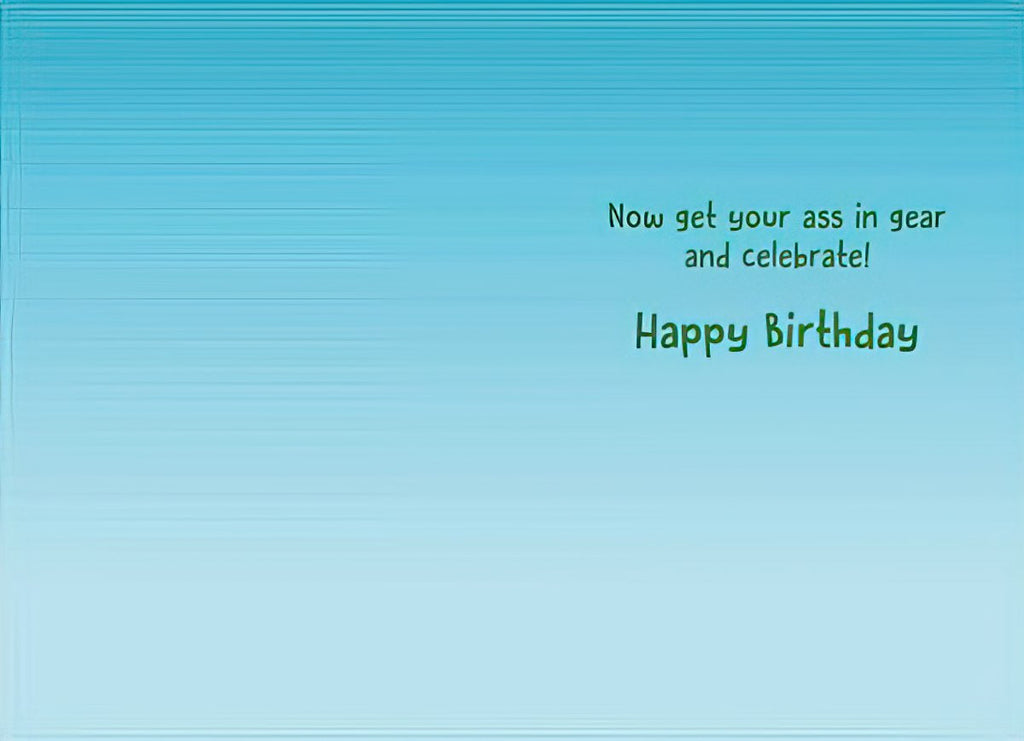 Inside of a crude funny celebration card with a light blue background, displaying the explicit message 'Now get your ass in gear and celebrate! Happy Birthday' in a casual font.