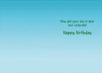 Inside of a crude funny celebration card with a light blue background, displaying the explicit message 'Now get your ass in gear and celebrate! Happy Birthday' in a casual font.