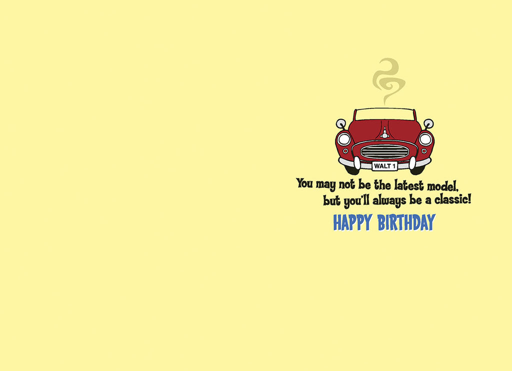 Inside of a funny birthday card displaying a small red classic car and the message: "You may not be the latest model, but you'll always be a classic! HAPPY BIRTHDAY." Perfect for older friends or family.