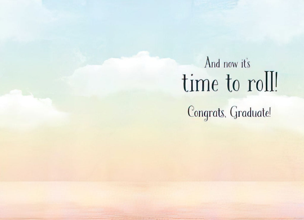 Inside of a congratulatory greeting card showing a light blue and peach sky background with clouds, and the celebratory message 'And now it's time to roll! Congrats, Graduate!' in elegant script.