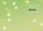 Inside of greeting card: light green background with bokeh circles, text 'IT GETS HARDER AND HARDER TO FIND YOUR NUTS. SO ENJOY YOUR BIRTHDAY.' and a pair of black spectacles illustration.