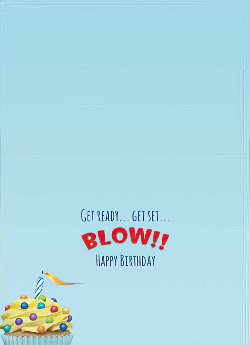 Inside of a light blue greeting card, revealing a playful message 'GET READY... GET SET... BLOW!! HAPPY BIRTHDAY' in bold red and black text, with a partial view of the colorful cupcake with a candle at the bottom.