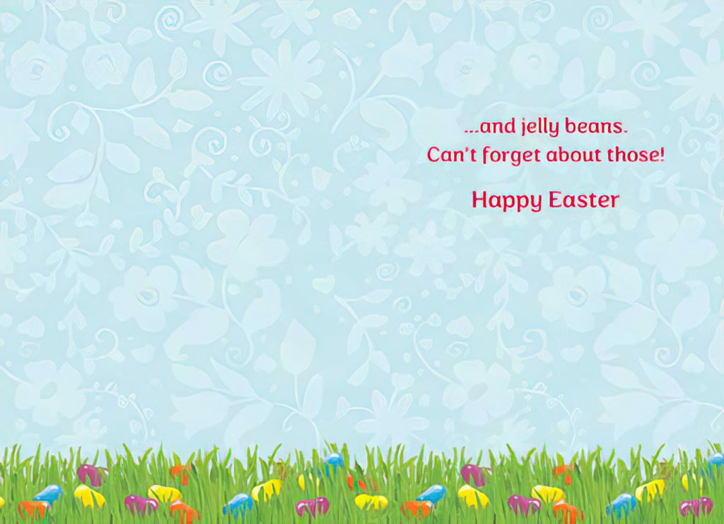Inside of an Easter greeting card with a light blue background, subtle floral patterns, and text reading '...and jelly beans. Can't forget about those! Happy Easter.' The bottom features green grass with small colorful jelly beans.
