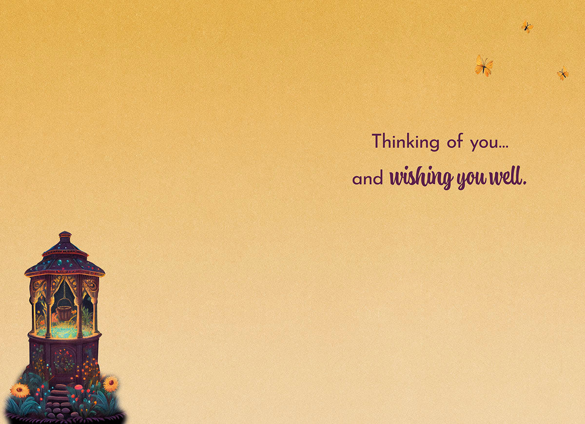 Interior of gazebo wishing well card: 'Thinking of you... and wishing you well.' on a light orange background.