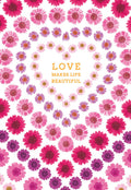 Front of a beautiful greeting card featuring a heart shape formed by concentric circles of vibrant pink and purple daisy flowers. The text 'LOVE MAKES LIFE BEAUTIFUL' is centered within the heart, on a white background.