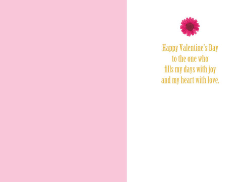Inside a heartfelt Valentine's Day card showing a light pink left panel and a white right panel with a single pink flower at the top and gold text reading 'Happy Valentine's Day to the one who fills my days with joy and my heart with love.'