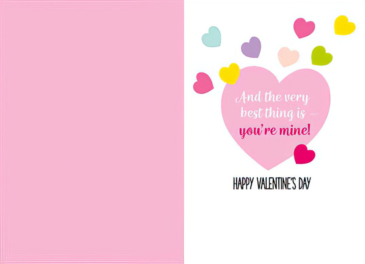 Inside of a romantic Valentine's Day card, displaying a pink heart with the heartfelt message 'And the very best thing is - you're mine!' surrounded by colorful floating hearts, wishing 'HAPPY VALENTINE'S DAY'.