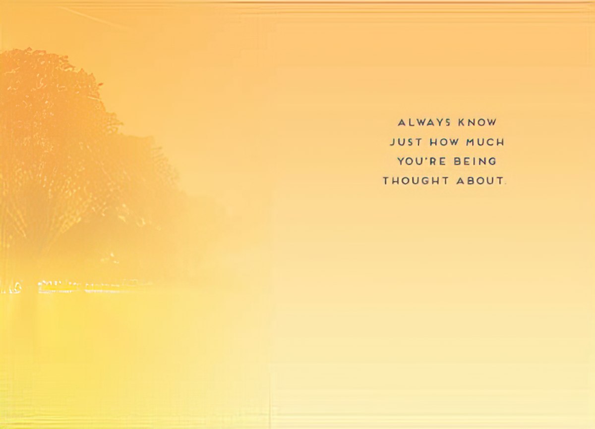 The interior of the sunrise tree card, featuring a warm yellow background and a message about being thought about.
