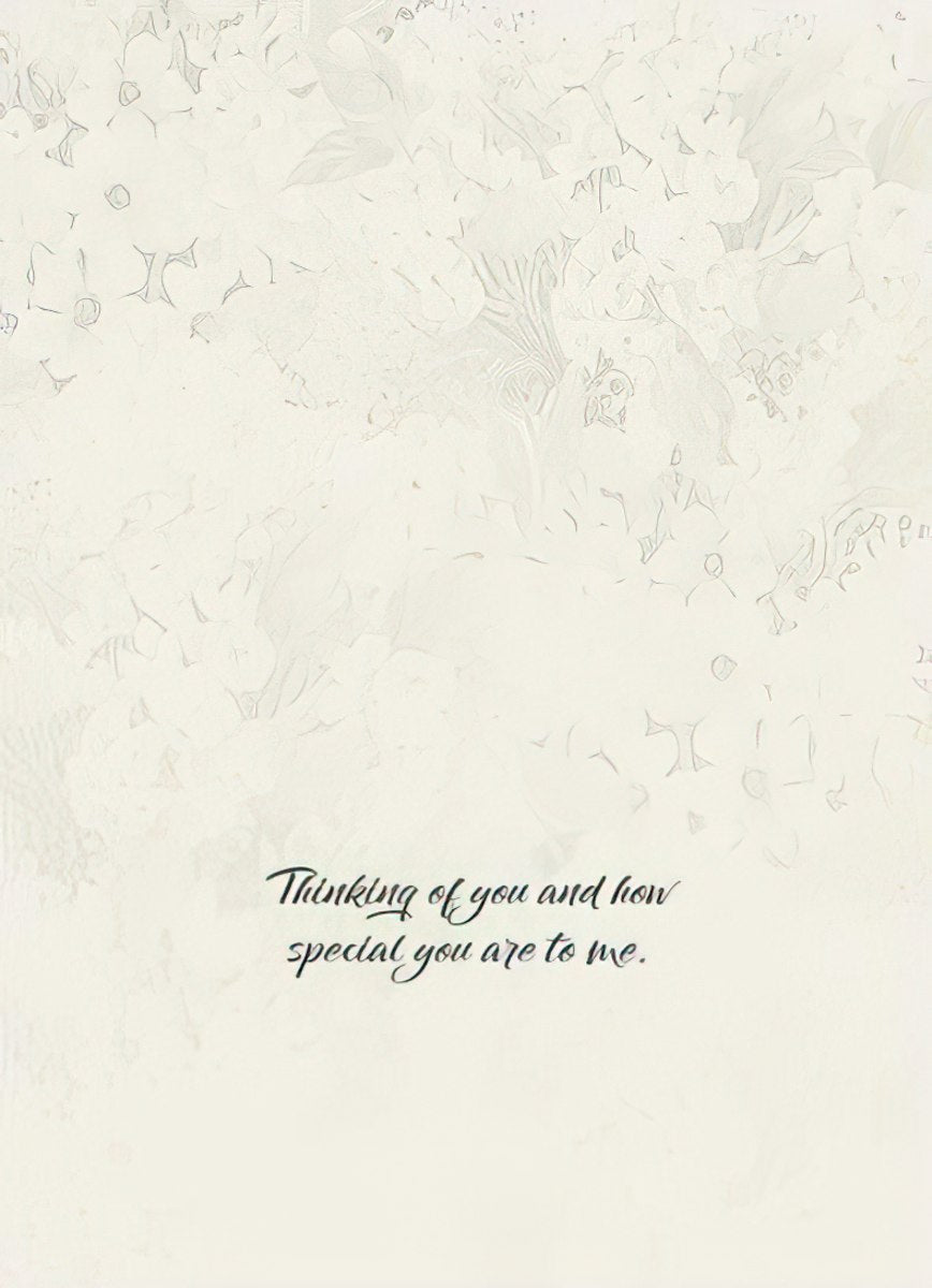 The interior of the "FAITH HOPE LOVE" card with a subtle textured background and the message "Thinking of you and how special you are to me."