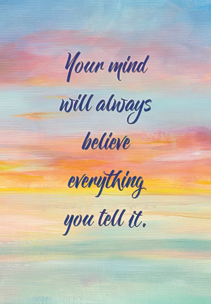 The front of an encouraging card with sunset hues and the message "Your mind will always believe everything you tell it."