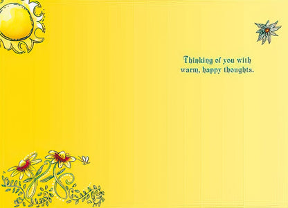 The bright yellow interior of the "Feel Better Sunshine" card with a border of small flowers and the message "Thinking of you with warm, happy thoughts."