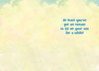 Inside view of a funny get well card with a light yellow background and the text 'At least you've got an excuse to sit on your ass for a while!' in blue lettering, offering a cheeky message for recovery.