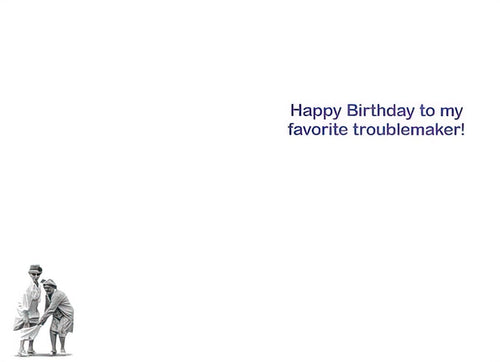 Inside of a funny greeting card with purple text 'Happy Birthday to my favorite troublemaker!' and a small image of two mischievous older women, ideal for a humorous friend's card.