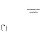 Inside of a humorous birthday card with the message 'Another year rolls by! Happy Birthday' and a small toilet paper roll illustration.