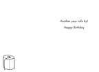 Inside of a funny greeting card with text 'Another year rolls by! Happy Birthday' and a small cartoon toilet paper roll, ready for a special message.